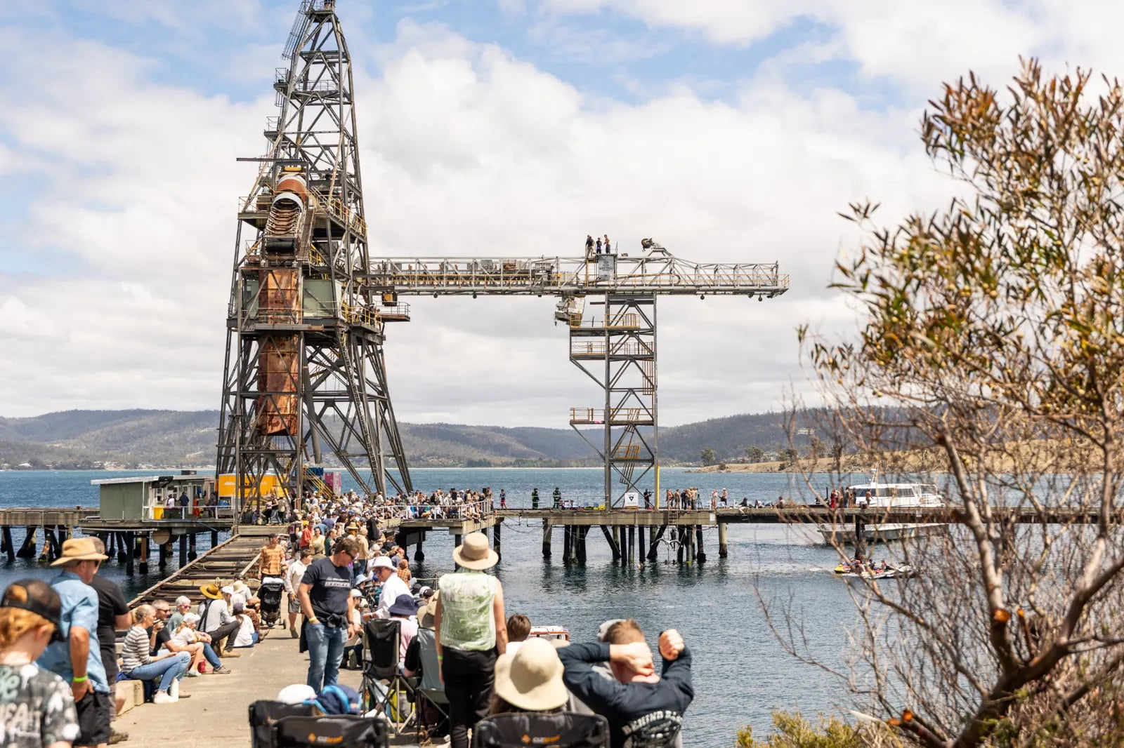 Spectators lining the Spring Bay Mill wharf at Off The Edge 2026